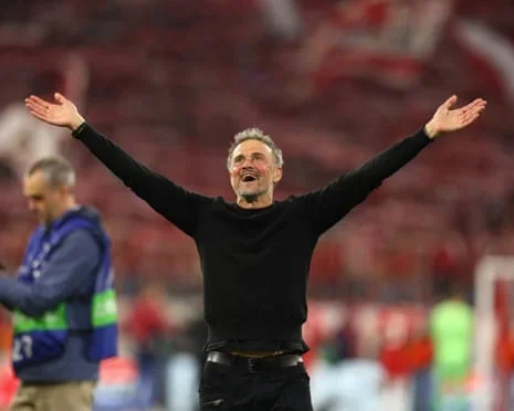 Party time in Munich: Luis Enrique revels in PSG’s victory over Bayern.